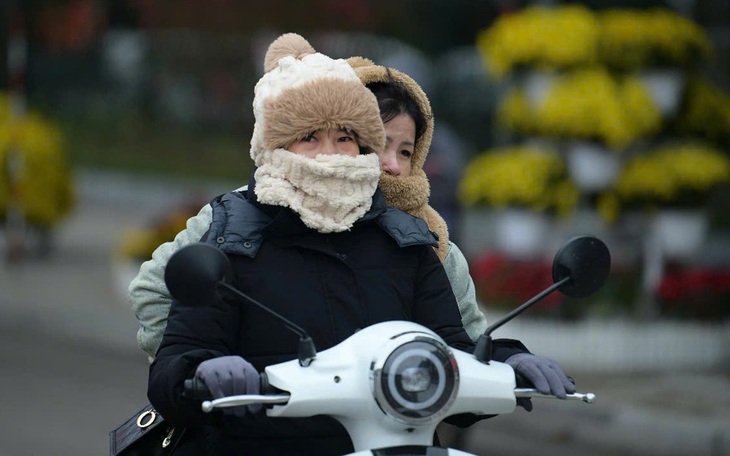 Không khí lạnh áp sát, ngày mai nhiệt độ miền Bắc giảm 8-10 độ C - Ảnh 2.