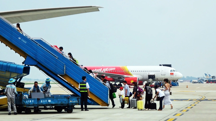 Giảm thuế, phí... có ghìm được giá vé máy bay? - Ảnh 3.