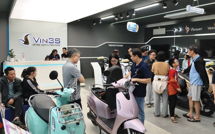 Xe điện hút khách - Ảnh 2.