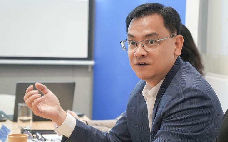 Tỉ giá trong thế gọng kìm - Ảnh 1.