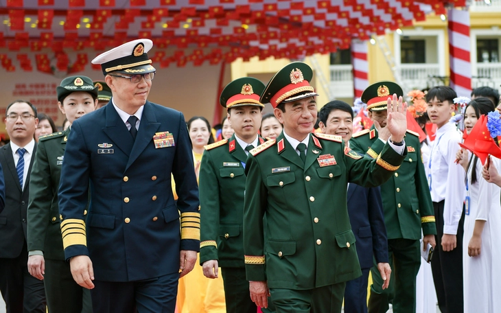 Hai Bộ trưởng Bộ Quốc phòng Việt Nam - Trung Quốc hội đàm - Ảnh 2.