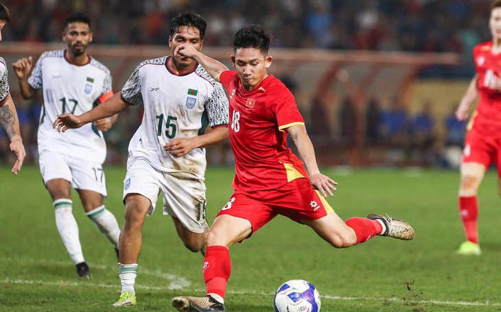 HLV Kim Sang Sik - Ảnh 1.