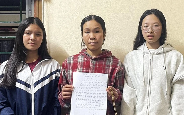 Hai mẹ con nhặt được túi xách chứa nhiều tiền liền báo công an tìm người trả lại - Ảnh 2.