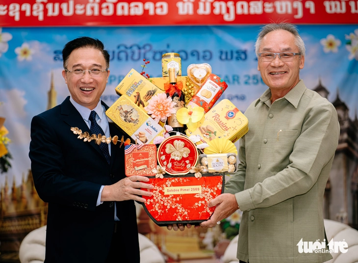 TP.HCM chúc mừng Tết cổ truyền Bunpimay của Lào - Ảnh 2.