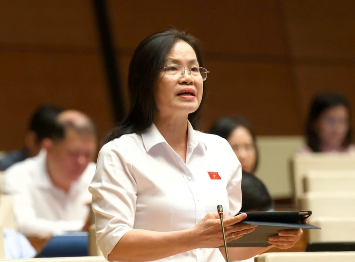 Có nên bỏ quy định người dân đi công chứng phải chụp ảnh cùng công chứng viên? - Ảnh 1.