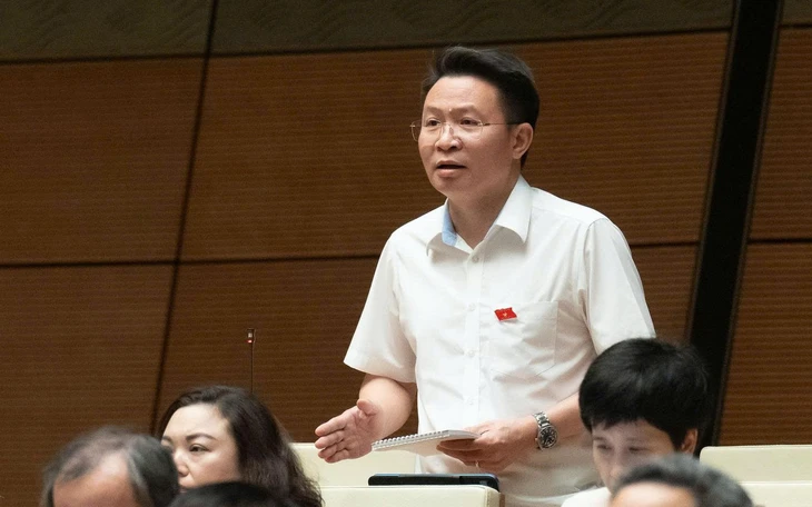 Có nên bỏ quy định người dân đi công chứng phải chụp ảnh cùng công chứng viên? - Ảnh 2.