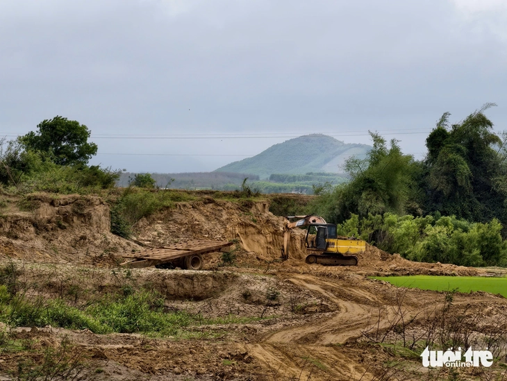 múc đất - Ảnh 4.