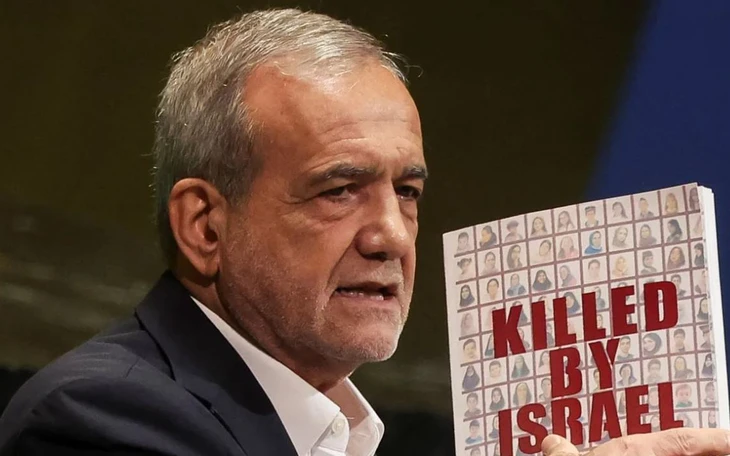 Iran lập 'lá chắn người' bảo vệ nhà máy điện, dừng tàu hỏa trước đe dọa của Mỹ - Israel - Ảnh 2.