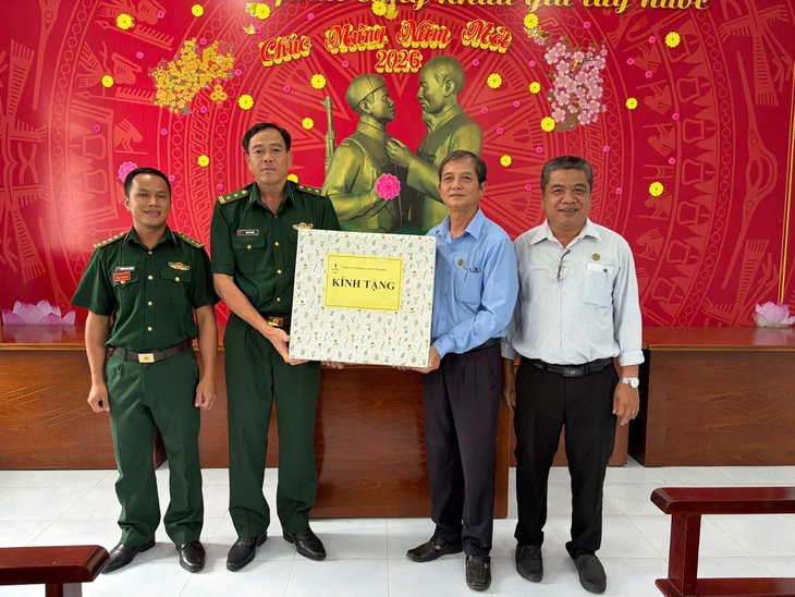 Cao su Tân Biên: phát triển kinh tế, phối hợp bảo vệ an ninh - Ảnh 2.