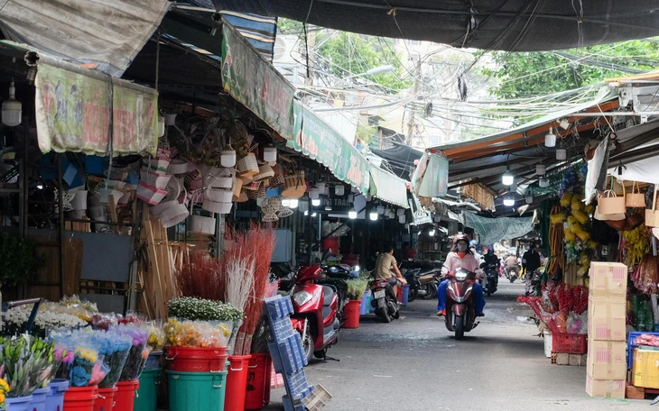 Nhiều hộ dân tất bật di dời, bàn giao mặt bằng mở rộng đường Trần Bình Trọng  - Ảnh 3.