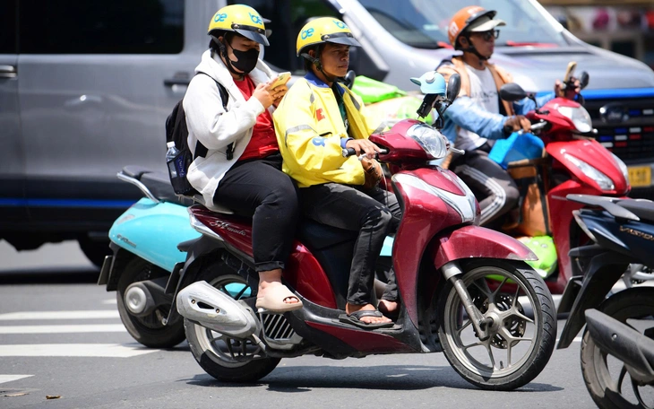 Cái giá để Grab và GoTo được ở lại Indonesia - Ảnh 2.