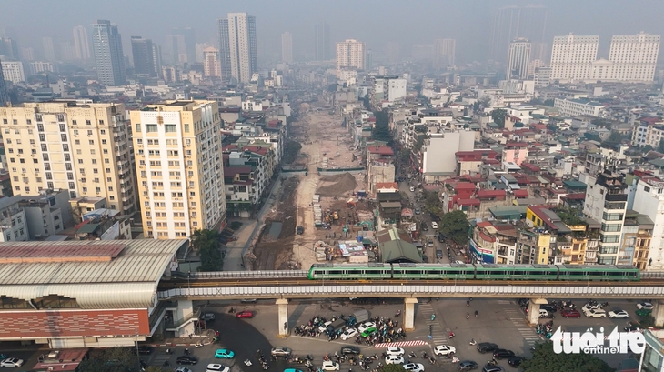 Hà Nội phê duyệt dự án bãi đỗ xe, trạm sạc ở dải đất giữa đường vành đai 1 và đường La Thành - Ảnh 1.