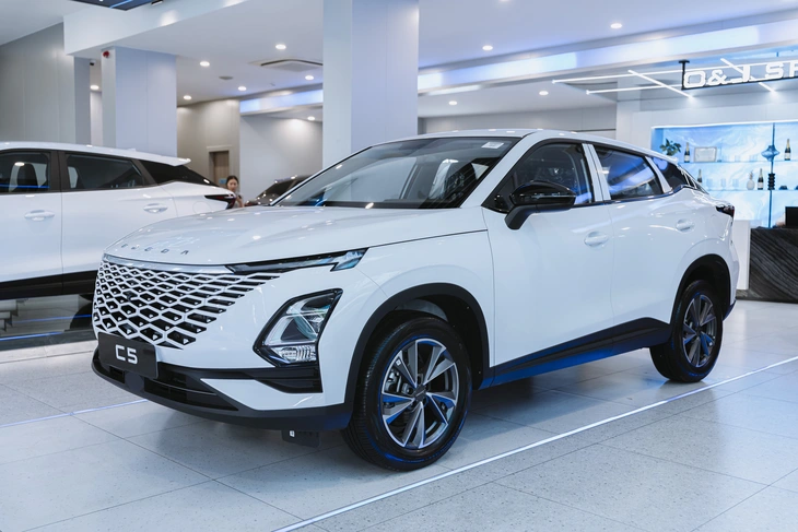 Omoda C5 bổ sung bản Sport ở Việt Nam: Giá 559 triệu, đi 5 năm không tốn tiền xăng, thêm lựa chọn đấu Toyota Yaris Cross - Ảnh 1.