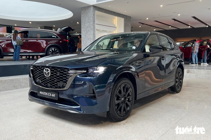 Mazda CX-60 chốt giá 1,699 tỉ ở Việt Nam: Máy hybrid 280 mã lực, AWD, to cỡ Mercedes-Benz GLC - Ảnh 1.
