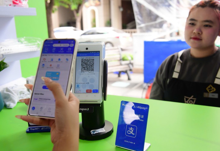Napas đẩy mạnh thanh toán xuyên biên giới qua mã QR - Ảnh 2.