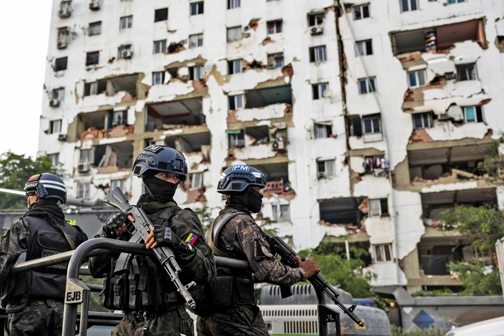 Sau động đất ở Venezuela: Người cứu nạn, kẻ cướp bóc giữa đống đổ nát - Ảnh 2.