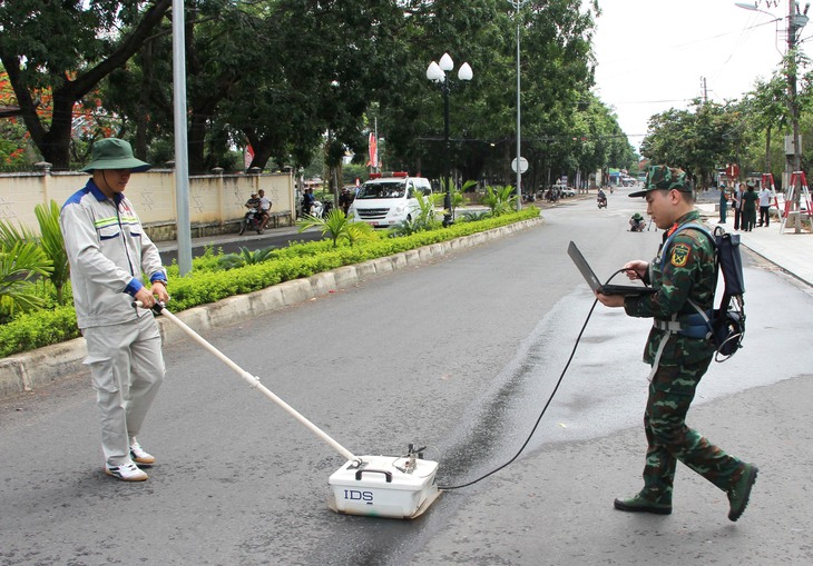 mộ tập thể liệt sĩ - Ảnh 1.