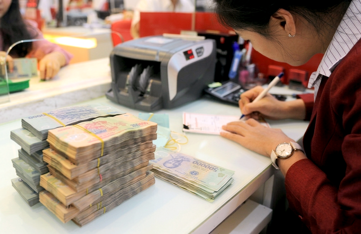 EVN gửi ngân hàng 152.000 tỉ đồng, các tập đoàn lớn khác gửi bao nhiêu? - Ảnh 1.