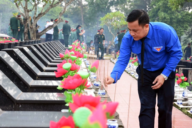 Đồng Nai truy điệu, an táng 63 hài cốt liệt sĩ về lòng đất mẹ - Ảnh 10.