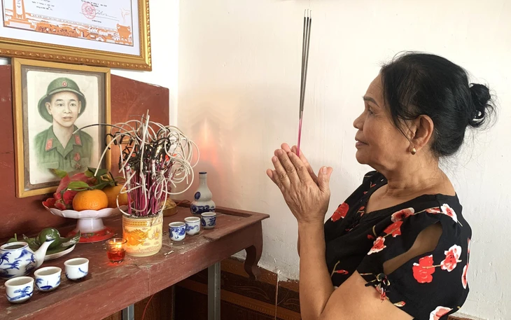 Xúc động nhận Bằng Tổ quốc ghi công đúng dịp Ngày Thương binh - Liệt sĩ - Ảnh 3.