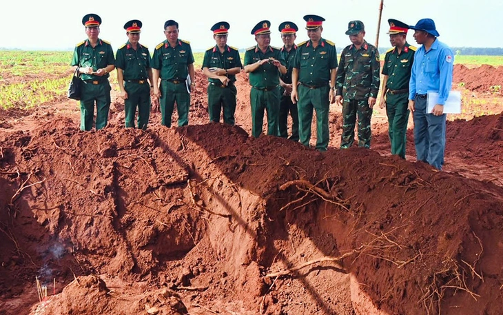 Mở rộng tìm kiếm hố chôn liệt sĩ ở Đồng Nai, phát hiện một bộ hài cốt còn nguyên vẹn - Ảnh 5.