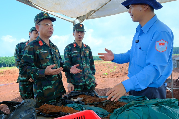 Mở rộng tìm kiếm hố chôn liệt sĩ ở Đồng Nai, phát hiện một bộ hài cốt còn nguyên vẹn - Ảnh 3.