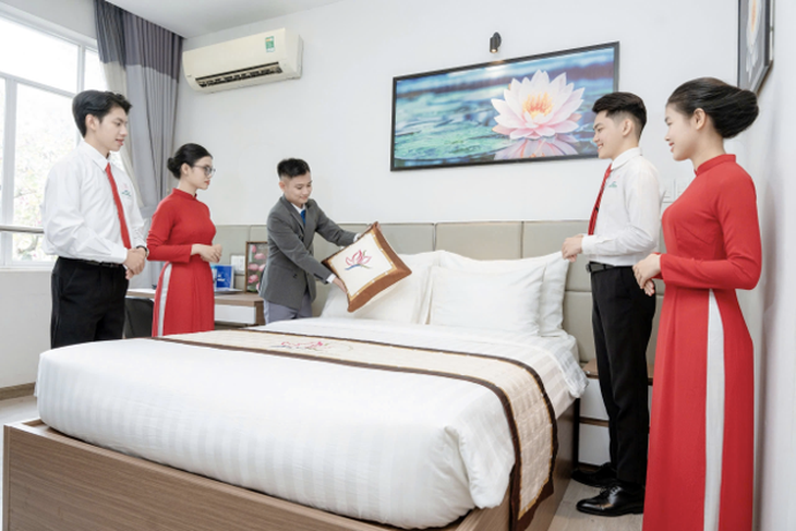 Điểm chuẩn Trường Đại học Nguyễn Tất Thành 3 năm qua tăng giảm ra sao? - Ảnh 4.