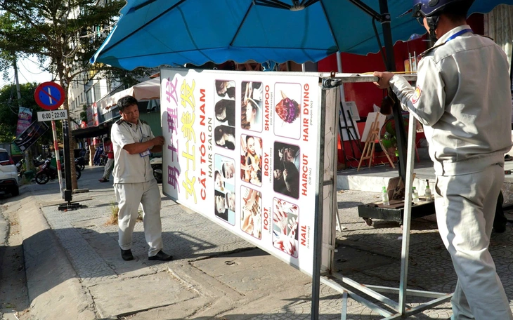Hơn 1 tháng xử lý biển hiệu 'trắng' tiếng Việt: nơi chuyển động, nơi vẫn chưa rục rịch - Ảnh 1.