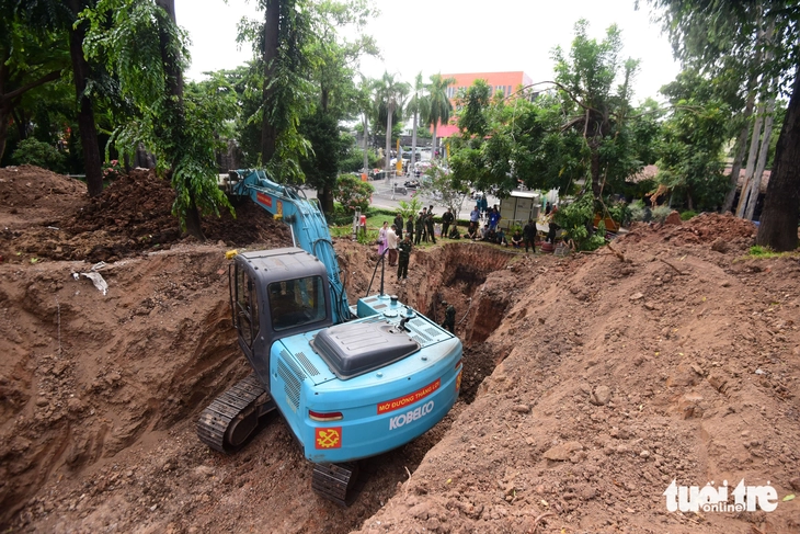 Phát hiện thêm vị trí mới có mộ liệt sĩ tại công viên Lê Thị Riêng, bước đầu tìm thấy 3 hài cốt - Ảnh 1.