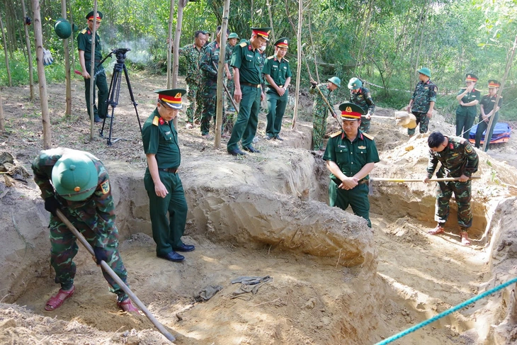 Tìm thấy 10 hài cốt liệt sĩ tại chiến trường Câu Nhi, nơi 93 chiến sĩ hy sinh - Ảnh 1.