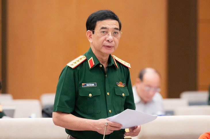 Đại tướng Phan Văn Giang trình dự Luật sửa 9 luật về quân sự, quốc phòng - Ảnh 1.