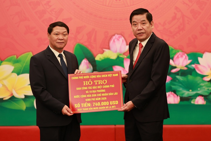 Lào đồng hành tìm kiếm, quy tập hài cốt liệt sĩ Việt Nam hy sinh trên nước bạn hồi hương - Ảnh 2.