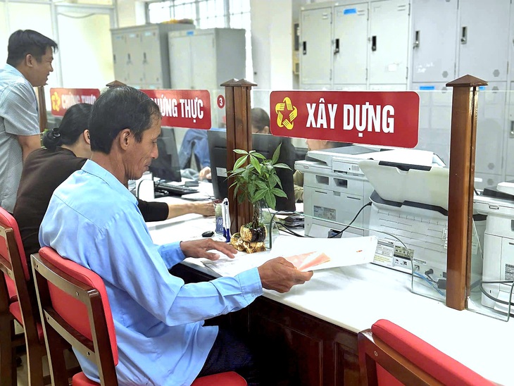 Vĩnh Long bãi bỏ thu phí scan giấy tờ khi làm sổ đỏ năm 2026 - Ảnh 2.