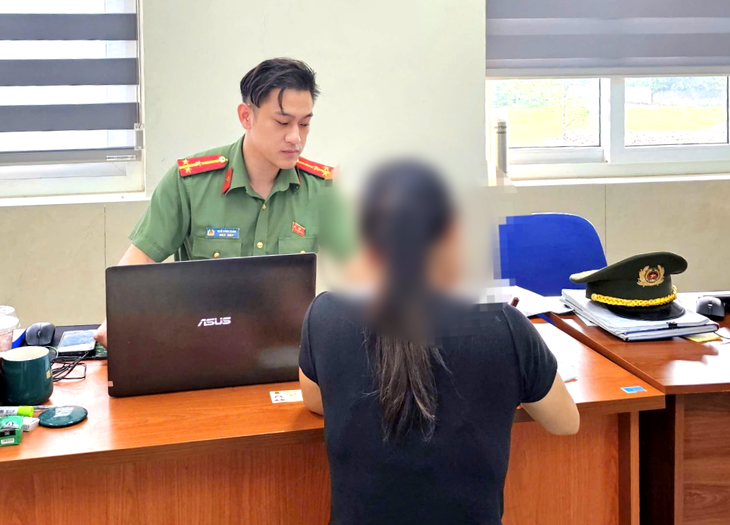 Công an mời một phụ nữ tham gia nhóm Facebook có nội dung xuyên tạc lên làm việc - Ảnh 2.