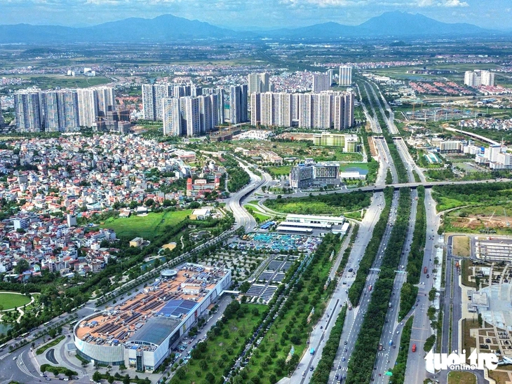 Hà Nội rào chắn đường gom Đại lộ Thăng Long đến hết năm 2026 để thi công - Ảnh 2.