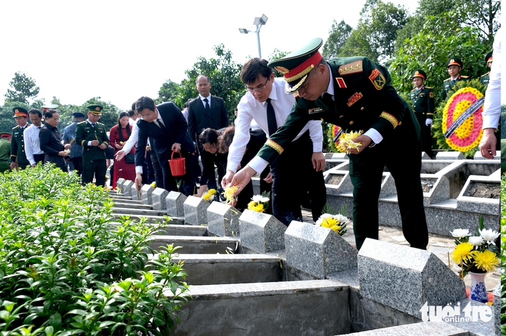 Đồng Tháp truy điệu và an táng 68 hài cốt liệt sĩ   - Ảnh 6.