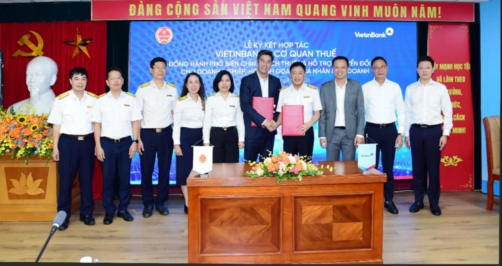VietinBank bắt tay Cục Thuế hỗ trợ hộ kinh doanh chuyển đổi số - Ảnh 1.