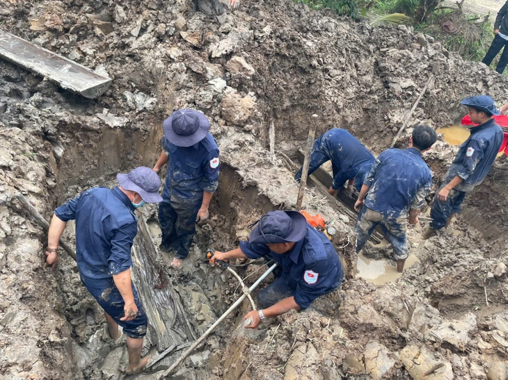 Qua thông tin cựu chiến binh, dân cung cấp, Đội K92 cất bốc được 3 hài cốt liệt sĩ ở xã Vĩnh Ty - Ảnh 1.