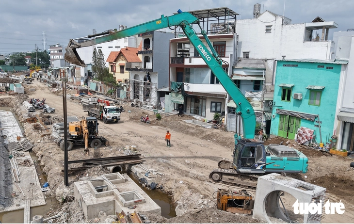 Rạch Xuyên Tâm thông thoáng mặt bằng, các gói thầu tăng tốc thi công - Ảnh 6.