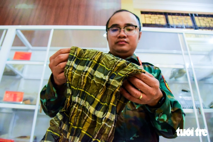 Khăn quàng cổ ở công viên Lê Thị Riêng mở manh mối tìm danh tính liệt sĩ biệt động Sài Gòn - Ảnh 1.