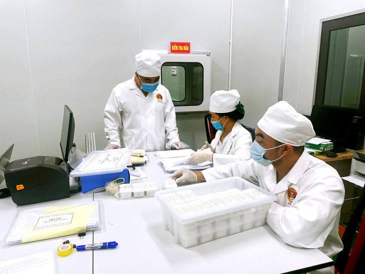 Mẫu ADN hài cốt liệt sĩ di chuyển máy may từ Chu Lai ra Hà Nội - Ảnh 4.