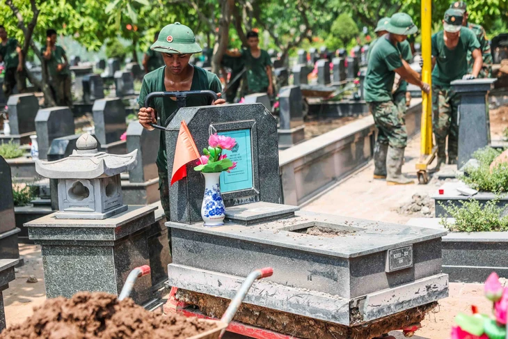 Khai quật tìm danh tính 469 Liệt sĩ chống Pháp sau 70 năm tại Nghĩa trang Mai Dịch - Ảnh 8.