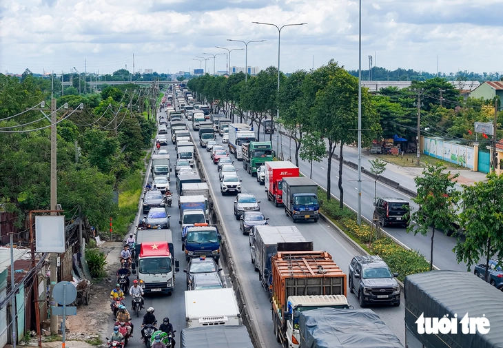 Mặt bằng đang nối liền, quốc lộ 22 ‘áp sát’ mốc khởi công - Ảnh 1.