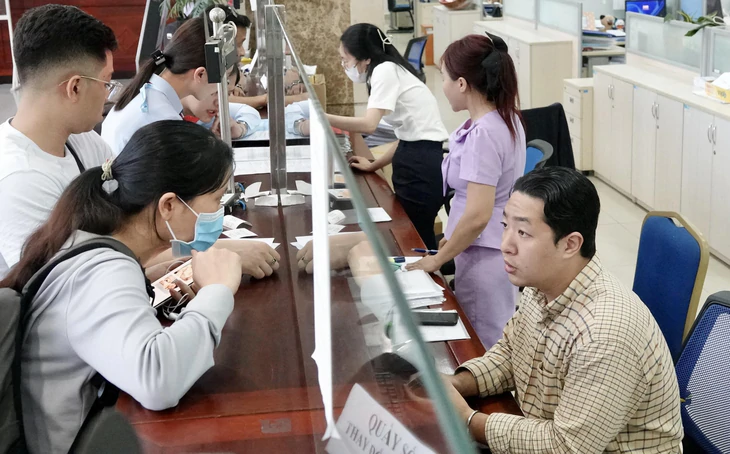 Được giảm 30% thuế cả năm, hộ kinh doanh, doanh nghiệp phải nộp bao nhiêu nữa? - Ảnh 1.