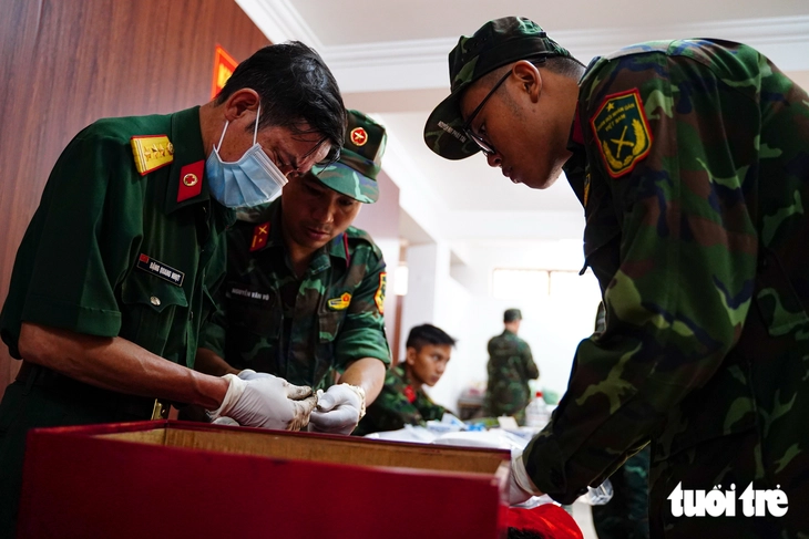 TP. HCM hoàn thành lấy mẫu ADN hơn 9.800 hài cốt liệt sĩ tại các nghĩa trang - Ảnh 1.