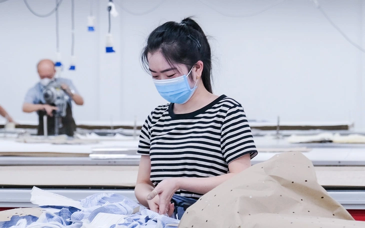 Bộ Tài chính: Tăng lương 8% không tạo áp lực lớn lên giá cả - Ảnh 2.