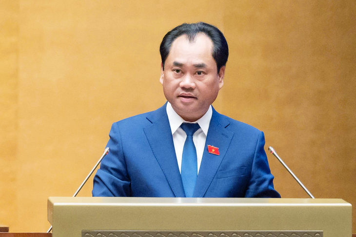 Đại biểu đề nghị không bỏ công chứng giao dịch về đất đai, Bộ trưởng Trịnh Việt Hùng trao đổi lại - Ảnh 2.
