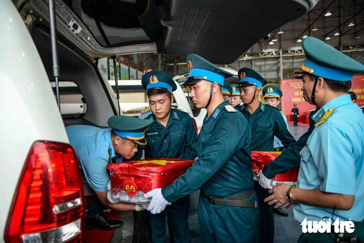 7.104 mẫu sinh phẩm hài cốt liệt sĩ từ TP Hồ Chí Minh đã tới Hà Nội - Ảnh 12.