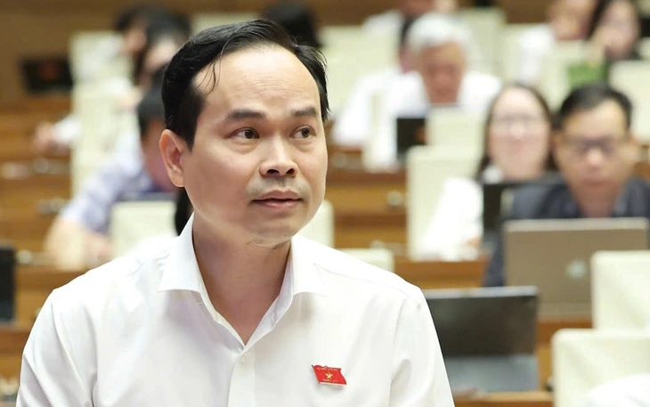 Đại biểu đề nghị không bỏ công chứng giao dịch về đất đai, Bộ trưởng Trịnh Việt Hùng trao đổi lại - Ảnh 3.