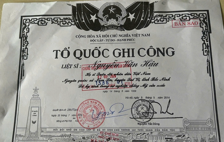 Tìm ra cô gái trong bức ảnh dưới mộ liệt sĩ vừa khai quật lấy mẫu ở Đà Nẵng, người này còn sống - Ảnh 5.